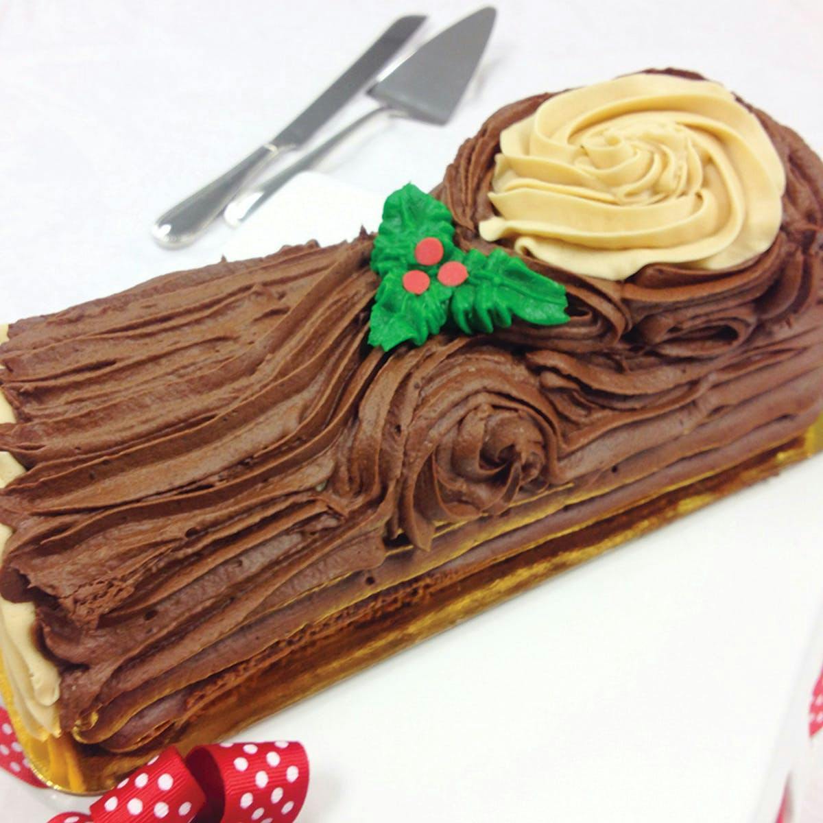 Carolina Christmas Yule Log Cake by Caroline's Cakes - Goldbelly